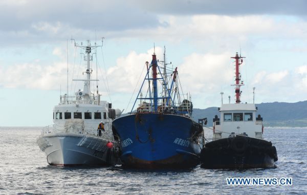 The detained Chinese fishing trawler is flanked by two Japanese Coast Guard vessels during an investigation by Japanese authorities near Ishigaki Island in Okinawa Prefecture of Japan Sept. 12, 2010. 