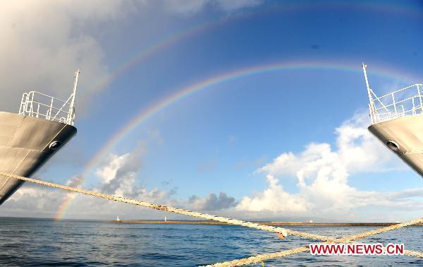 Rainbow is seen near the detained Chinese fishing trawler in Ishigaki Island of Okinawa Prefecture, Japan, Sept. 13, 2010. 