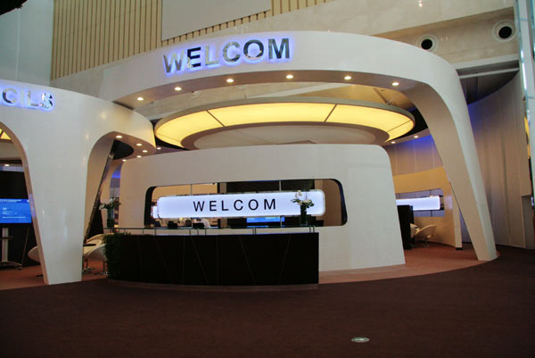 A WELCOM station in the convention center. The World Economic Forum's website describes WELCOM, which stands for World Economic Leaders Community, is described as 'a powerful new online communication and collaboration space designed specifically for the world's top decision-makers' with tools to connect and meet with peers and experts. 