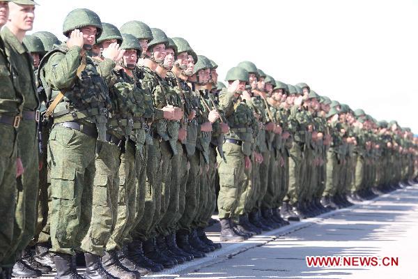 Chinese soldiers participate in the opening ceremony of the second phase of the joint anti-terror drills of the Shanghai Cooperation Organization (SCO), at the Matybulak range near the largest Kazakh city of Almaty on Sept. 13, 2010. The exercises, dubbed &apos;Peace Mission 2010,&apos; entered the second phase on Monday. [Wang Jianmin/Xinhua] 