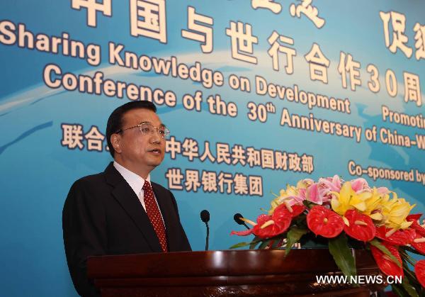 Chinese Vice Premier Li Keqiang addresses the Conference ot the 30th Anniversary of China-World Bank Cooperation in Beijing, Sept. 13, 2010. [Liu Weibing/Xinhua] 