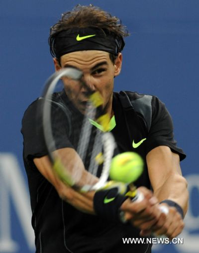 Rafael Nadal of Spain returns the ball during the men's singles final with Novak Djokovic of Serbia at the US Open tennis tournament in New York Sept. 13, 2010. (Xinhua/Shen Hong) (wll) 