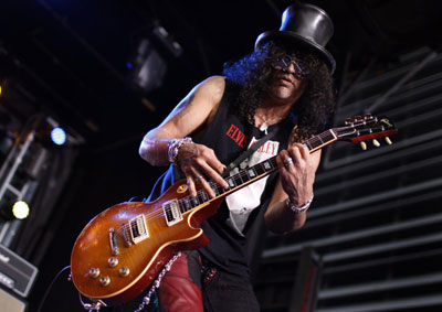 Slash performs during a pre-game concert before the NFL football game