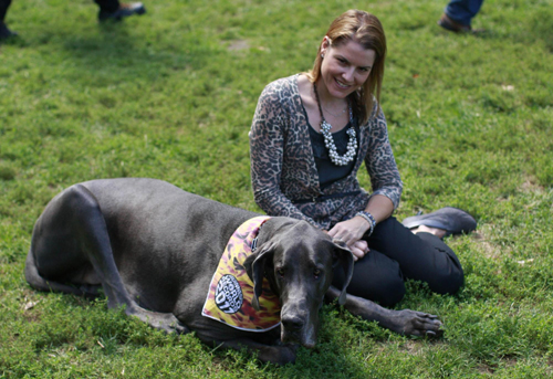 Guinness World Record&apos;s Tallest Living Dog, Giant George, poses with its owner Christine Nasser during a photo call in New York Sept 15, 2010. [China Daily/Agencies]