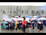 Students visit the 9.18 Historical Museum in Shenyang, capital of northeast China's Liaoning Province, Sept. 17, 2010.  