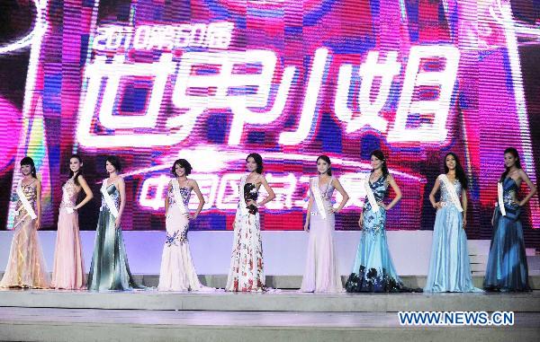 Contestants display their evening dresses at the China Pageant final of the 60th Miss World, in Shenzhen, south China&apos;s Guangdong Province, Sept. 17, 2010. [Chen Yehua/Xinhua]