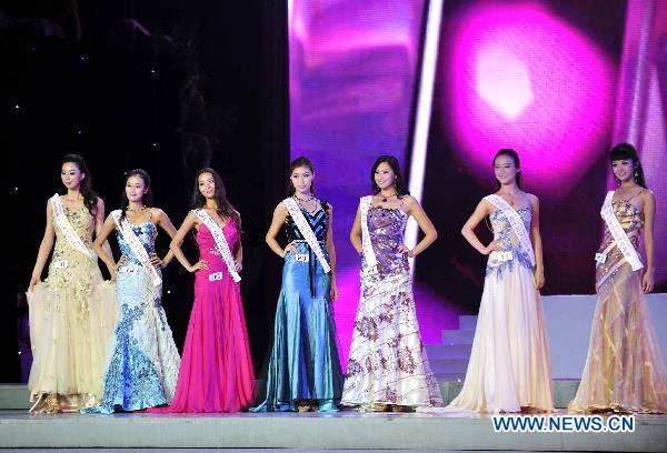 Contestants display their evening dresses at the China Pageant final of the 60th Miss World, in Shenzhen, south China&apos;s Guangdong Province, Sept. 17, 2010.[Chen Yehua/Xinhua]