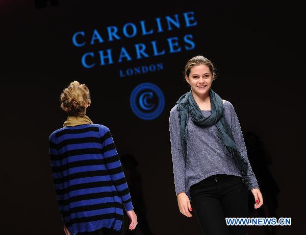 Models present creations of British designer Caroline Charles at London Fashion Week in London, Britain, Sept. 17, 2010. The London Fashion Week Spring/Summer 2011 collection, lasting from Sept. 17 to 22, opened in London Friday. [Zeng Yi/Xinhua]