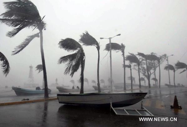 A small boat is seen on a street near seashore in Veracruz, Mexico, Sept. 17, 2010. Hurricane Karl on Friday struck Mexico&apos;s east coast, killing two people and forcing the country to shut down the Laguna Verde nuclear power station, a local radio reported. [Jorge Dan/Xinhua]