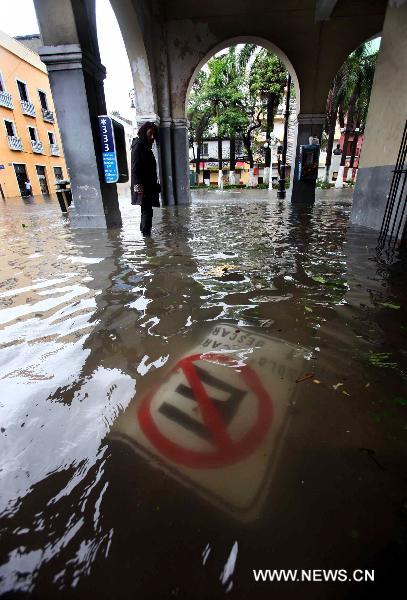 A street is flooded in Veracruz, Mexico, Sept. 17, 2010. Hurricane Karl on Friday struck Mexico&apos;s east coast, killing two people and forcing the country to shut down the Laguna Verde nuclear power station, a local radio reported. [Jorge Dan/Xinhua]