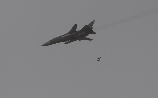 Chinese J-10 fighters are seen at an exercise of 'Peace Mission 2010' joint anti-terror drills conducted by five Shanghai Cooperation Organization (SCO) member states in Matybulak Range of Kazakhstan, Sept. 18, 2010. Troops from five SCO countries launched the first live firing drill Friday in the southern Kazakh training ground. [Wang Jianmin/Xinhua] 