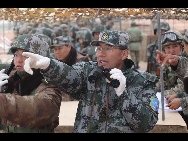 Chinese officials are seen at an exercise of 'Peace Mission 2010' joint anti-terror drills conducted by five Shanghai Cooperation Organization (SCO) member states in Matybulak Range of Kazakhstan, Sept. 18, 2010. Troops from five SCO countries launched the first live firing drill Friday in the southern Kazakh training ground. [Sohu]