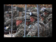 Officers of Kazakhstan are seen at an exercise of 'Peace Mission 2010' joint anti-terror drills conducted by five Shanghai Cooperation Organization (SCO) member states in Matybulak Range of Kazakhstan, Sept. 18, 2010. Troops from five SCO countries launched the first live firing drill Friday in the southern Kazakh training ground. [Sohu]