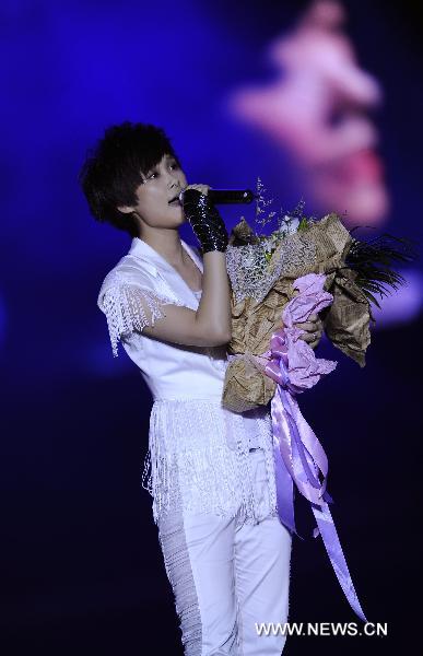 Singer Li Yuchun performs at a concert in the Sports Center in Chengdu, capital of southwest China's Sichuan Province, on September 20, 2010.