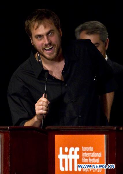 Director Jim Mickle speaks after being awarded the People's Choice Midnight Madness Award for his film 'Stake Land' during the 35th Toronto International Film Festival in Toronto, Canada, Sept. 19, 2010.