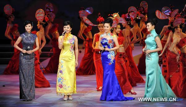 Singers and dancers perform at an evening gala celebrating the upcoming mid-autumn day in Hong Kong, south China, Sept. 19, 2010.