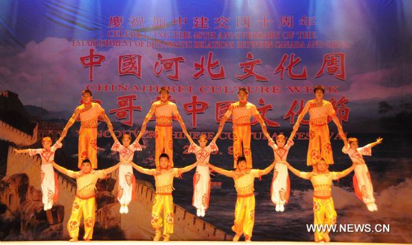 Acrobats from north China's Hebei Province perform during the opening ceremony of the Hebei Culture Week at the Vancouver Chinese Cultural Festival in Vancover, Canada, Sept. 17, 2010.
