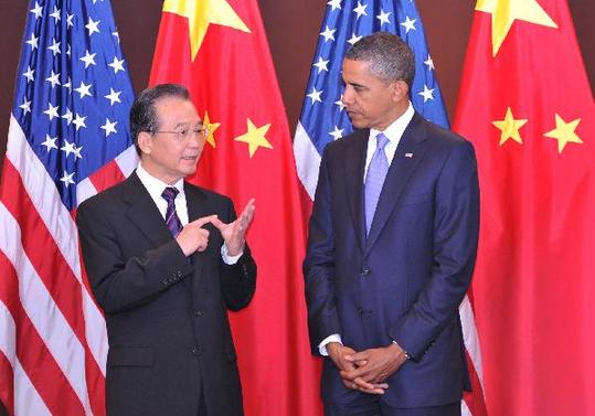 Chinese Premier Wen Jiabao (L) meets with U.S. President Barack Obama in New York, the United States, Sept. 23, 2010. [Huang Jinwen/Xinhua]