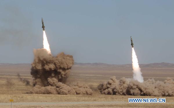 Tactical missiles are seen during the live-ammunition exercises of the &apos;Peace Mission 2010&apos; anti-terror drill at Matybulak Range, Kazakhstan, Sept. 24, 2010. [Wang Jianmin/Xinhua]