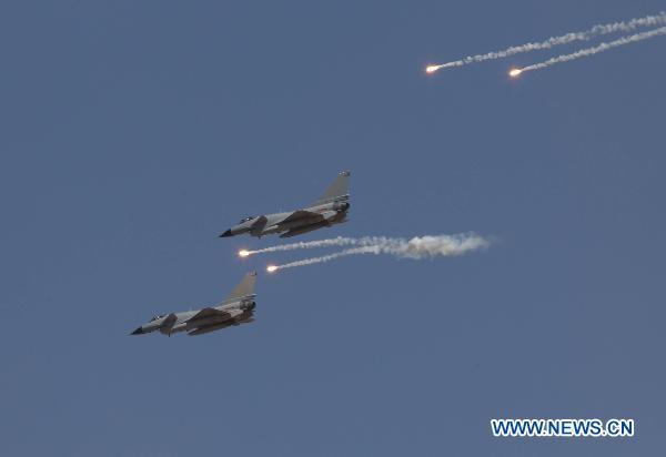 J-10 fighter jets are seen during the live-ammunition exercises of the &apos;Peace Mission 2010&apos; anti-terror drill at Matybulak Range, Kazakhstan, Sept. 24, 2010. [Wang Jianmin/Xinhua]