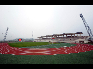 A brand-new sports stadium is pictured in the rebuilt Beichuan County, Sept. 14, 2010. [Xinhua]