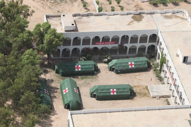 Aerial image taken on a helicopter of the Chinese helicopter rescue team during their first mission shows the camp of China&apos;s People&apos;s Liberation Army(PLA) medical rescue team in Sehwan, Pakistan, Sept. 25, 2010. The Chinese helicopter rescue team accomplished its first mission in flooded areas in Pakistan on Saturday. [Xinhua]