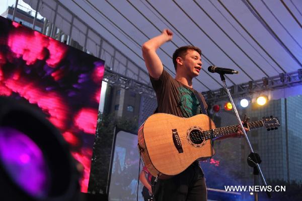 A singer performs during the World Revolution Music Festival in Macao, south China, Sept. 25, 2010. The musical events aimed to promote an anti-drugs society.