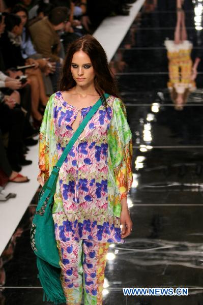 A model displays a creation as part of Just Cavalli spring-summer 2011 ready-to-wear collection during the Women's fashion week in Milan, Italy, Sept. 25, 2010.