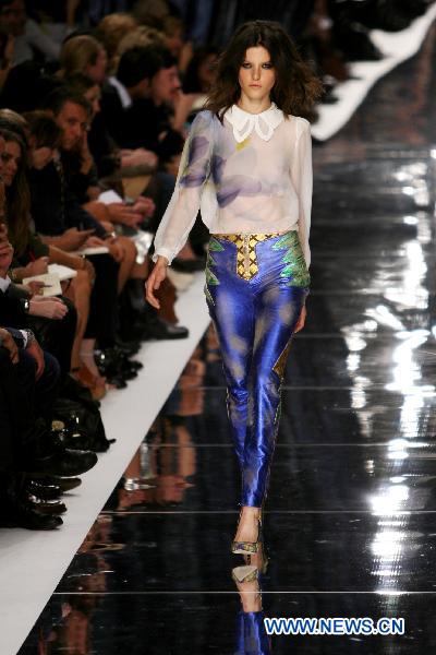 A model displays a creation as part of Just Cavalli spring-summer 2011 ready-to-wear collection during the Women's fashion week in Milan, Italy, Sept. 25, 2010.