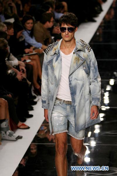 A model displays a creation as part of Just Cavalli spring-summer 2011 ready-to-wear collection during the Women's fashion week in Milan, Italy, Sept. 25, 2010.