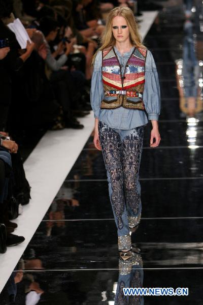 A model displays a creation as part of Just Cavalli spring-summer 2011 ready-to-wear collection during the Women's fashion week in Milan, Italy, Sept. 25, 2010.