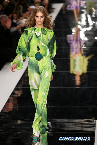 A model displays a creation as part of Just Cavalli spring-summer 2011 ready-to-wear collection during the Women's fashion week in Milan, Italy, Sept. 25, 2010.