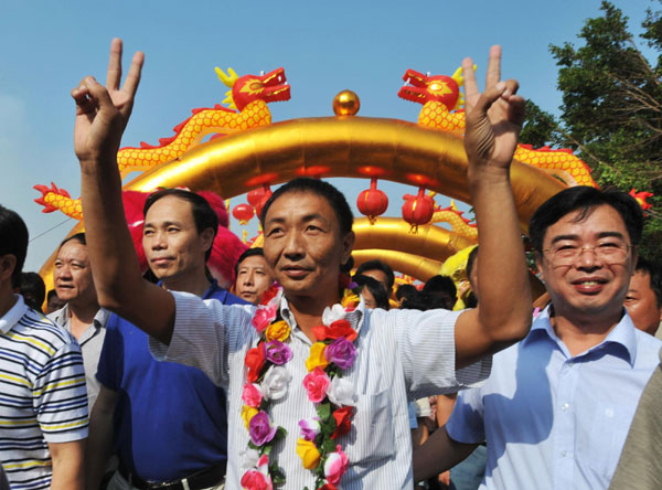 Chinese trawler captain back home