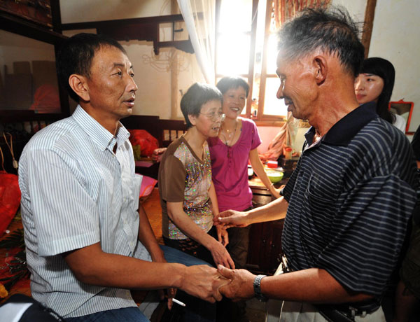 Chinese trawler captain back home