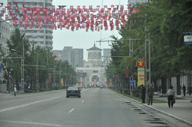 Photo taken on Sept. 27, 2010 shows a street is decorated with flags in Pyongyang, capital of the Democratic People&apos;s Republic of Korea (DPRK). [Xinhua] 