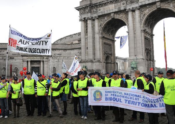 European workers and trade union representatives take part in a 'No to austerity! Priority for jobs and growth!' protest on the streets of Brussels, Belgium, Sept. 29, 2010. The demonstration was organised by the 27 trade unions of the EU countries. [Thierry Monasse/Xinhua]