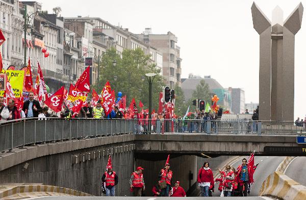 European workers and trade union representatives take part in a 'No to austerity! Priority for jobs and growth!' protest on the streets of Brussels, Belgium, Sept. 29, 2010. The demonstration was organised by the 27 trade unions of the EU countries. [Thierry Monasse/Xinhua]