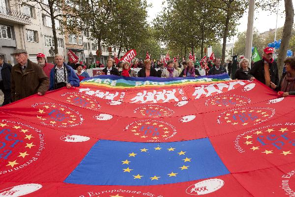 European workers and trade union representatives take part in a 'No to austerity! Priority for jobs and growth!' protest on the streets of Brussels, Belgium, Sept. 29, 2010. The demonstration was organised by the 27 trade unions of the EU countries. [Thierry Monasse/Xinhua]