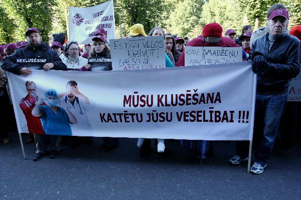 Latvian Free Trade Union Confederation's workers take part in a 'No to austerity, Priority for jobs and growth!' protest in Riga, capital of Latvia, Sept. 29, 2010. Nearly one thousand workers of Latvia attended the protest on Wednesday to protest against the government's austerity measures. [Yang Dehong/Xinhua]