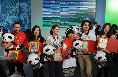 Six panda fans are named 'pambassadors' for 'Project Panda', which selects six panda ambassadors from five countries Wednesday to stay at the Chengdu Research Base of Giant Panda Breeding for one month in Chengdu, Southwest China's Sichuan province Sept 29, 2010. 