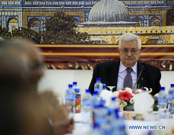 Palestinian President Mahmoud Abbas attends a meeting of the Executive Committee of Palestine Liberation Organization (PLO) in Ramallah, Oct. 2, 2010. The Palestinian leadership on Saturday decided not to continue peace talks with Israel over a dispute on Jewish settlement policy in the West Bank, a spokesman said. [Xinhua/Fadi Arouri] 