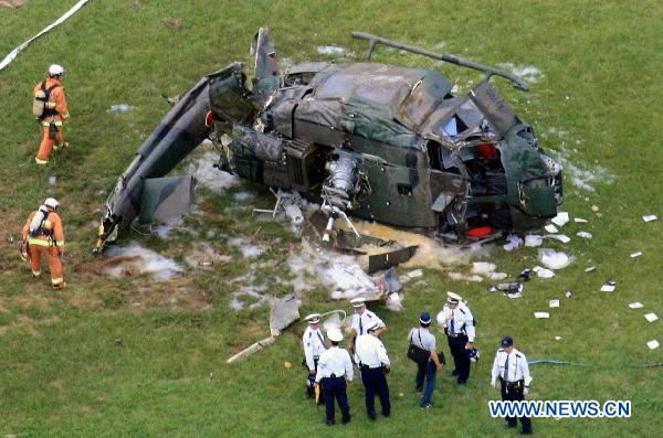 A crashed Japanese Ground Self-Defense Force (GSDF) chopper lies on the ground in the city of Yao in western Japan's Osaka prefecture Oct. 3, 2010. [Xinhua/Kyodo]