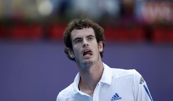 Andy Murray of Britain reacts during his first round match of men&apos;s singles against Paul-Henri Mathieu of France in 2010 China Tennis Open Tournament in Beijing, capital of China, Oct. 5, 2010. Murray won 2-0. [Wang Lili/Xinhua]