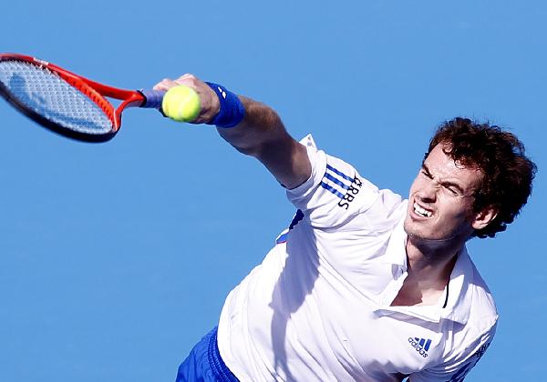 Andy Murray of Britain returns the ball to Paul-Henri Mathieu of France during the men&apos;s singles first round match at the China Open tennis tournament in Beijing, capital of China, Oct. 5, 2010. Murray won 2-0. [Chen Jianli/Xinhua] 