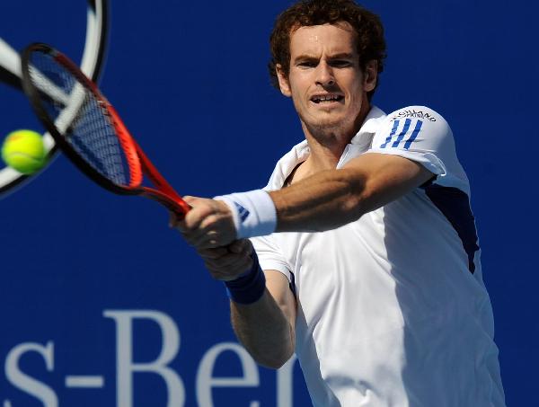 Andy Murray of Britain returns the ball to Paul-Henri Mathieu of France during the men&apos;s singles first round match at the China Open tennis tournament in Beijing, capital of China, Oct. 5, 2010. Murray won 2-0. [Gong Lei/Xinhua]