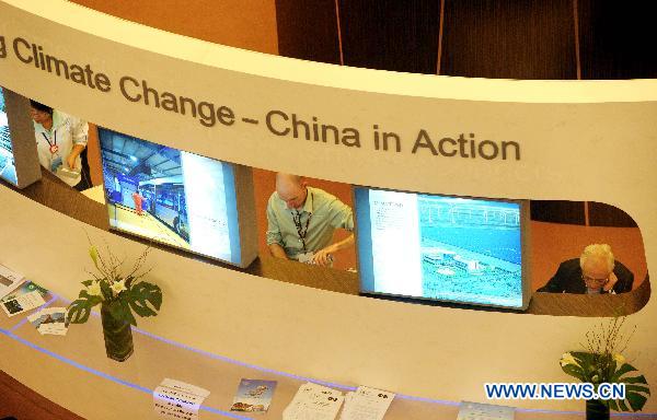 Photo taken on Oct. 5, 2010 shows the China echibiting area on the UN Climate Change Conference held in north China's Tianjin Municipality, Oct. 5, 2010. [Xinhua/Yue Yuewei] 