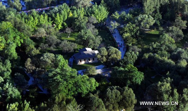 Photo taken on Oct. 2, 2010 shows the aerial view of Yan'an, in northwest China's Shaanxi Province. Yan'an has returned more than 8.82 million mu (about 558,000 hectares) grain plots to forestry since 1999, leaving a significant change on its landscape. [Xinhua/Tao Ming] 