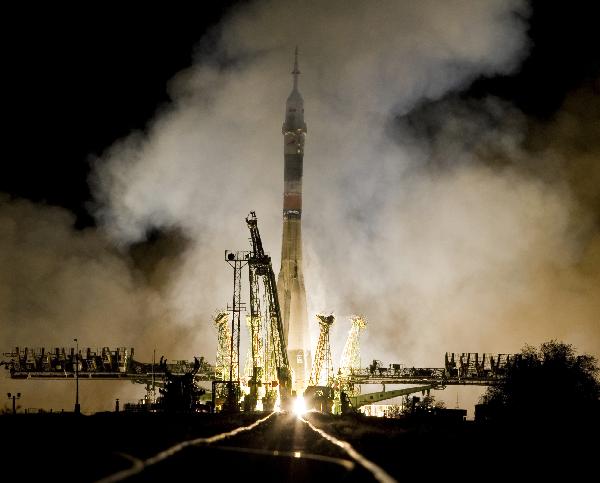 The Russian Soyuz TMA-01M spacecraft, carrying the International Space Station (ISS) crew of U.S. astronaut Scott Kelly, Russian cosmonauts Alexander Kaleri and Oleg Skripochka, blasts off from its launchpad at the Baikonur cosmodrome October 8, 2010. [Xinhua]