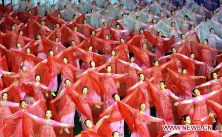 Mass gymnastic and artistic performance 'Arirang' is staged to celebrate the 65th anniversary of the founding of the Workers' Party of Korea (WPK) in Pyongyang, capital of the Democratic People's Republic of Korea (DPRK), Oct. 9, 2010.