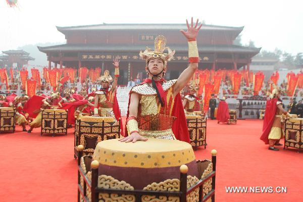 Troupers in traditional costumes play the drum at a memorial ceremony for Xun Zi, an ancient Chinese thinker and educator, in Anze County, north China's Shanxi Province, Oct. 10, 2010. The fifth China Xun Zi Cultural Festival kicked off here on Sunday. Xun Zi, by the name of Xun Kuang, was one of the great early contributors to Confucianism along with Confucius and Mencius during the Warring States period (403-221 B.C) in China.